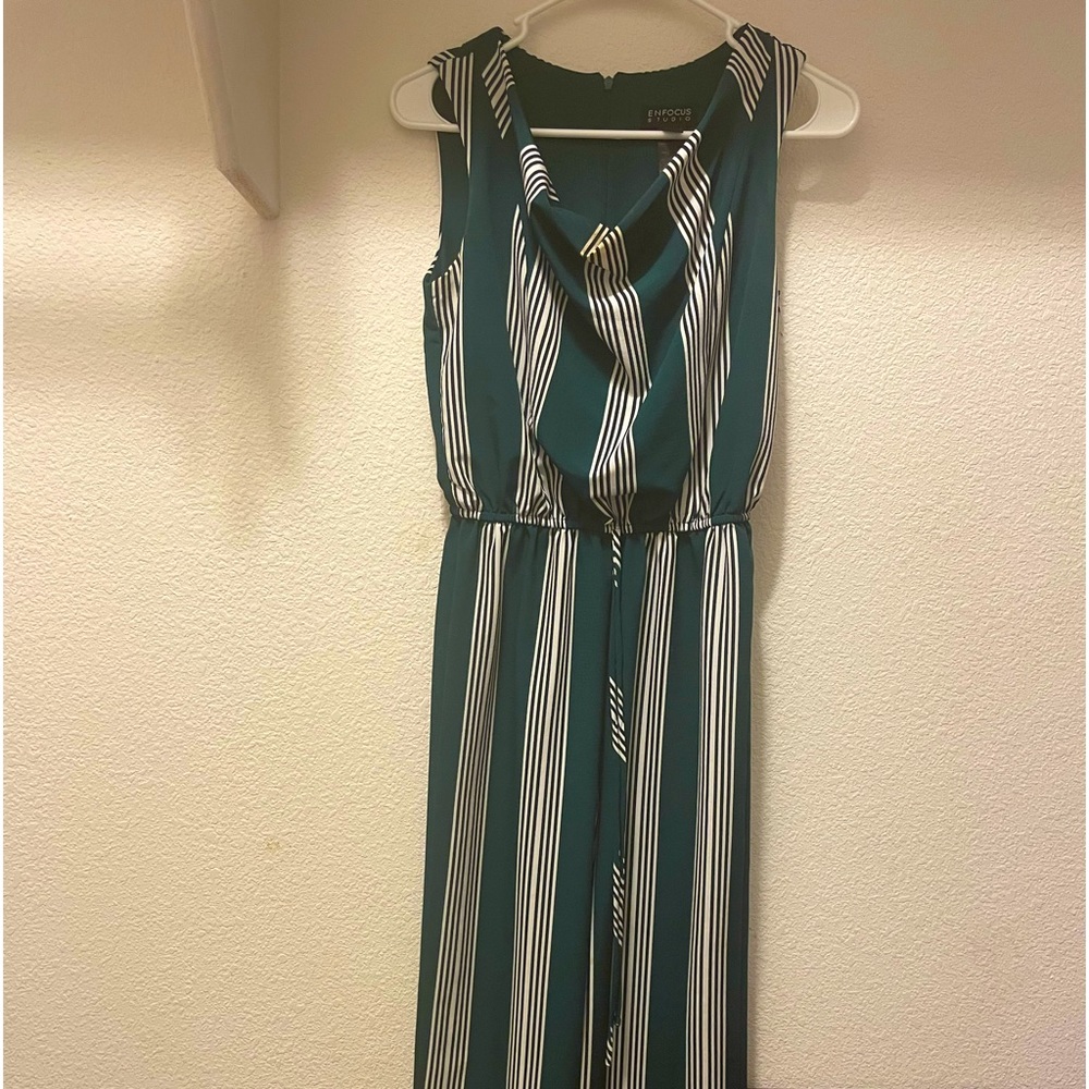 This is a romper very cute for church, size 4 from enfocus studio